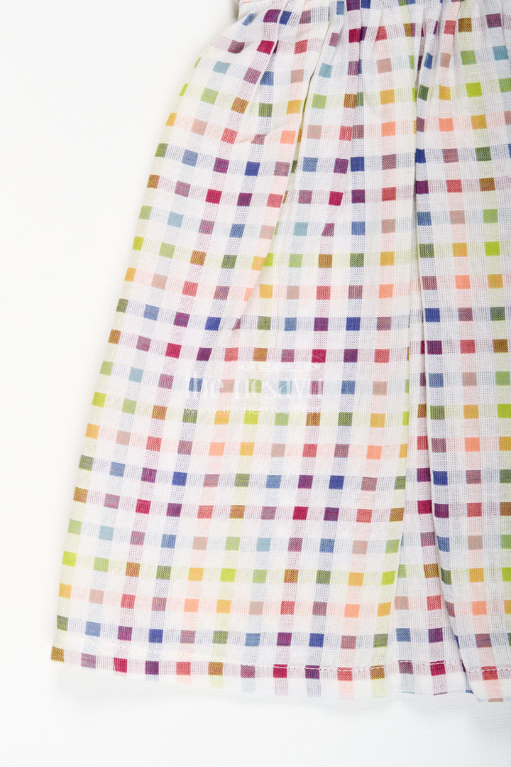 Muslin checked frock for toddler girls with pastel colors
