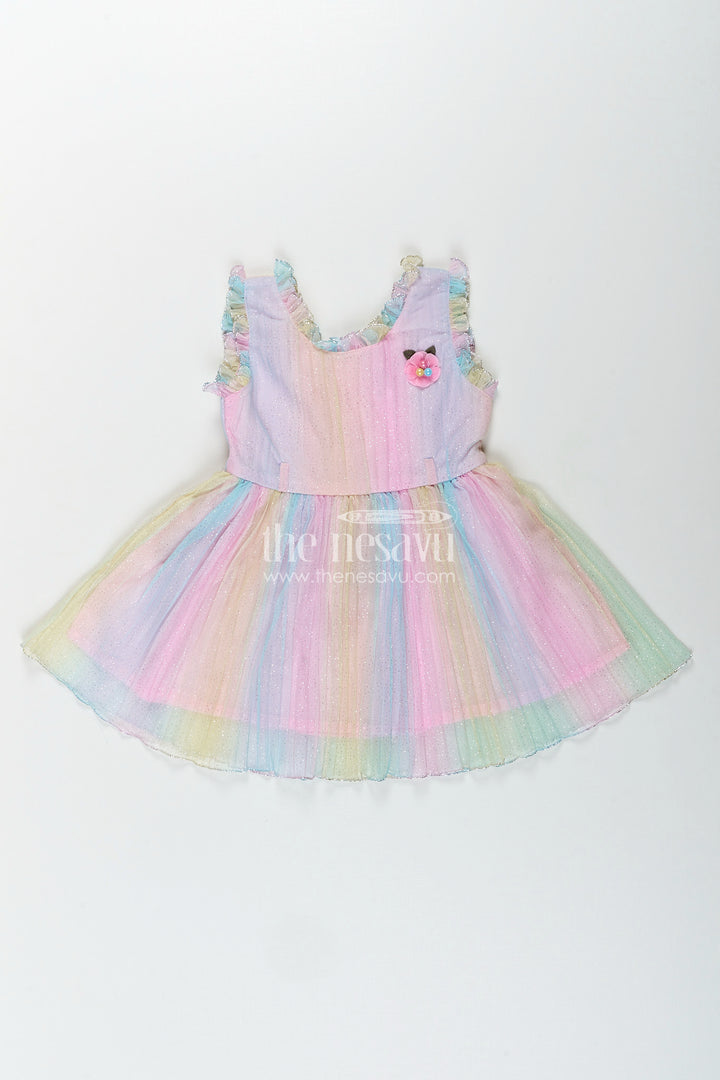 Rainbow pastel girls net frock with shimmer and flower brooch