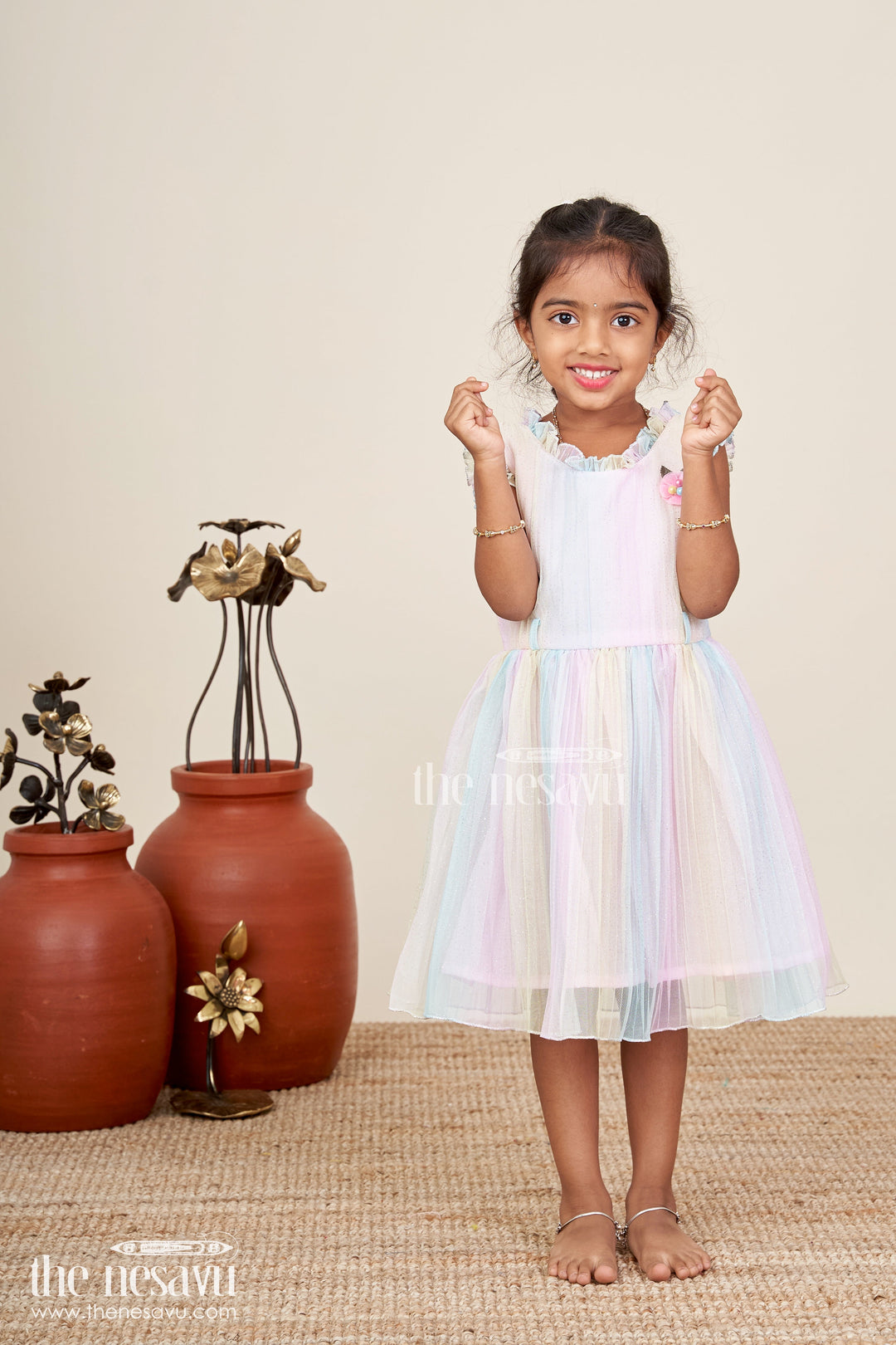 Rainbow pastel girls net frock with shimmer and flower brooch