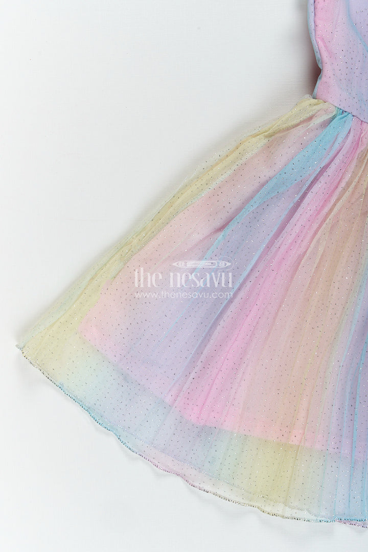 Rainbow pastel girls net frock with shimmer and flower brooch