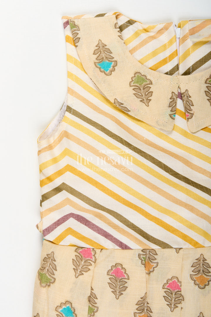 Girls cream frock with leaf block print and chevron stripes