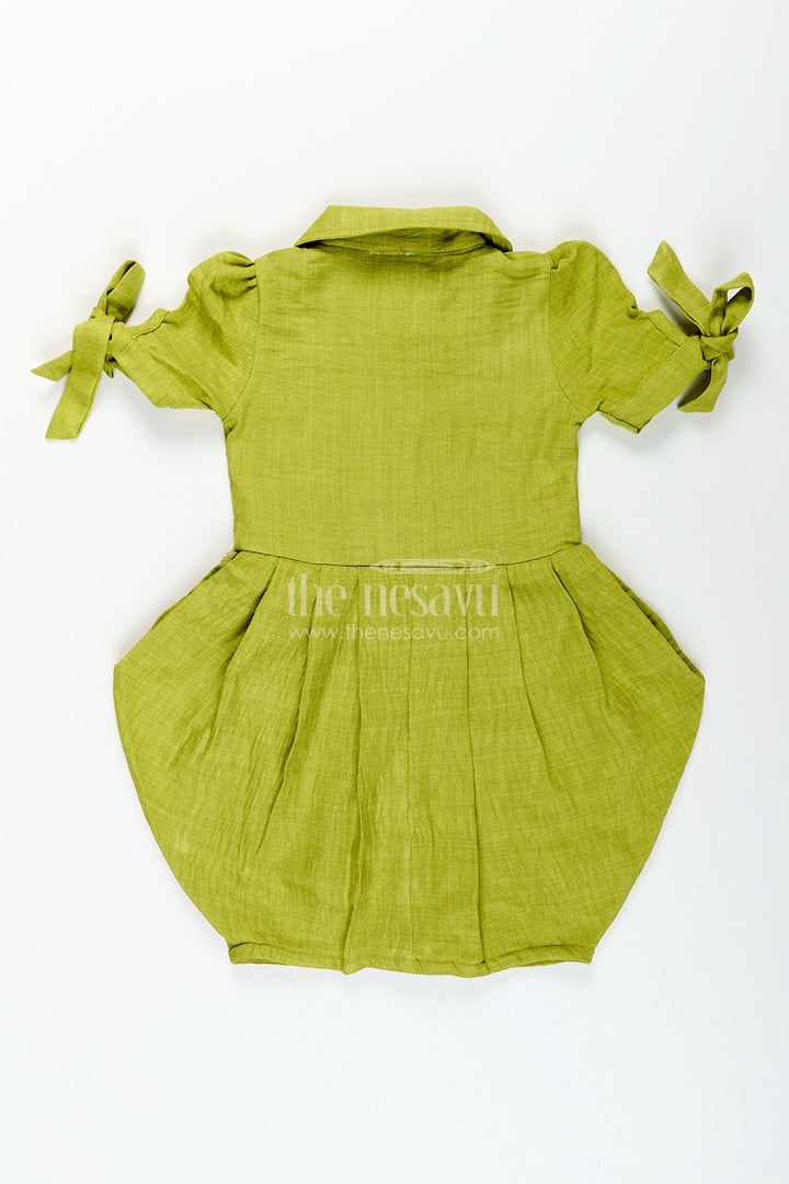 Green girls cotton frock with crochet patch and tie-up sleeves