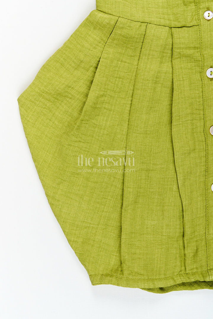 Green girls cotton frock with crochet patch and tie-up sleeves