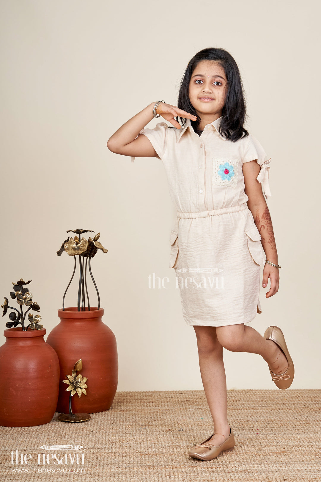 Beige girls cotton frock with collar and crochet flower patch