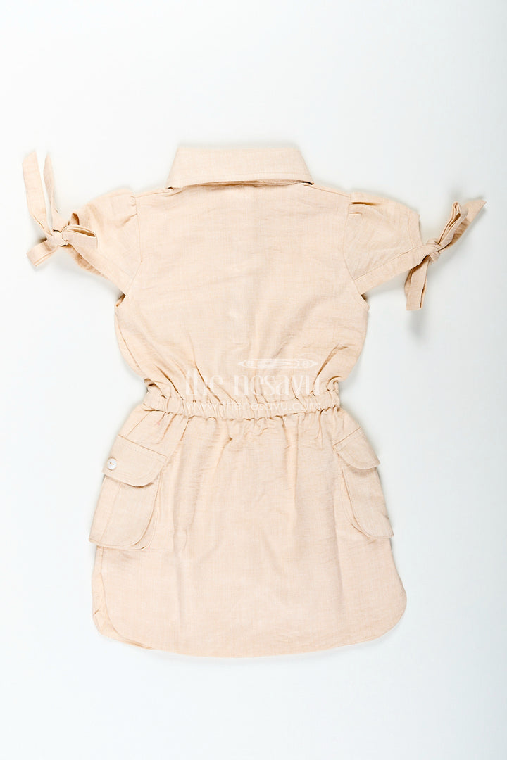 Beige girls cotton frock with collar and crochet flower patch
