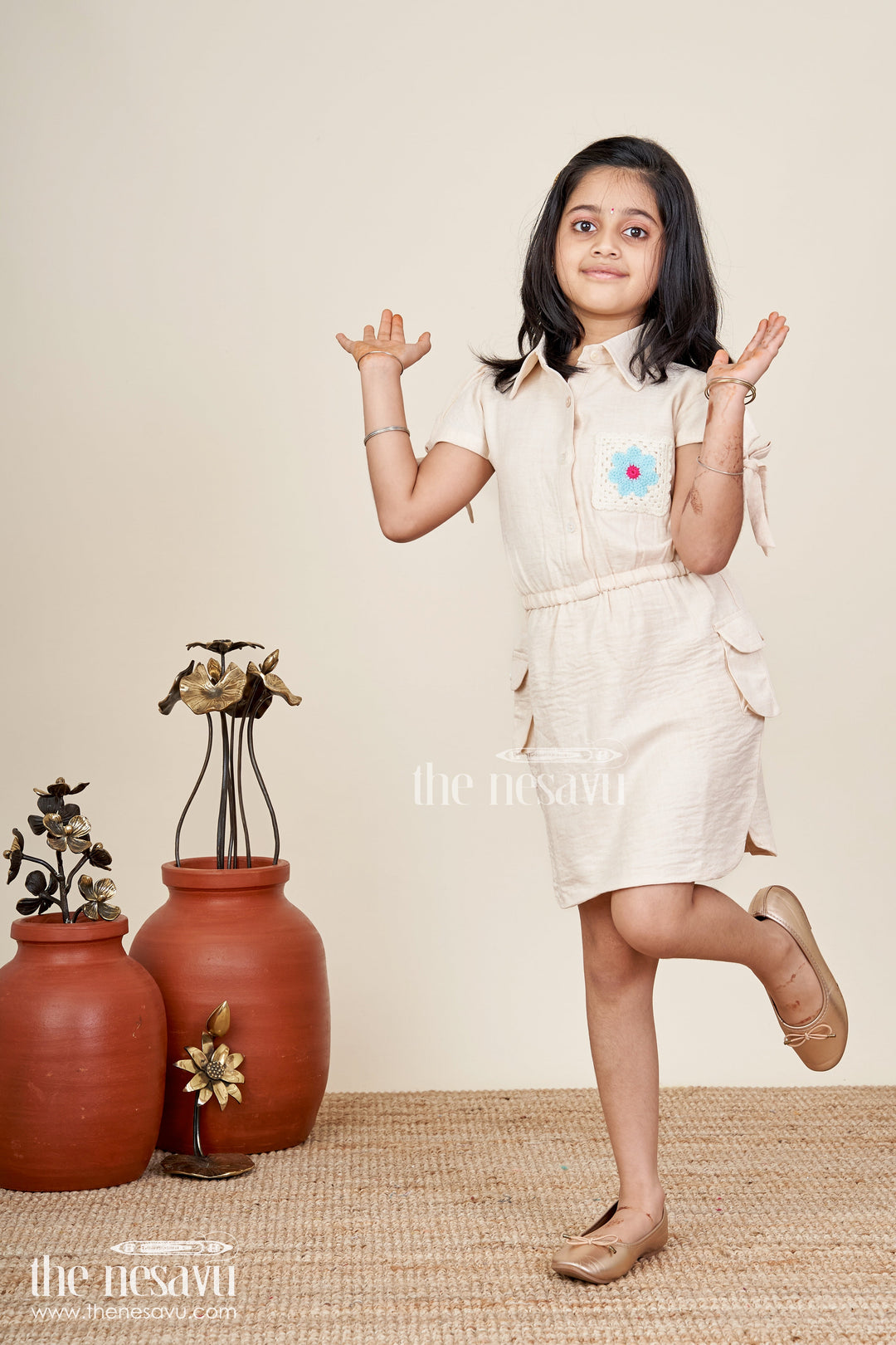 Beige girls cotton frock with collar and crochet flower patch