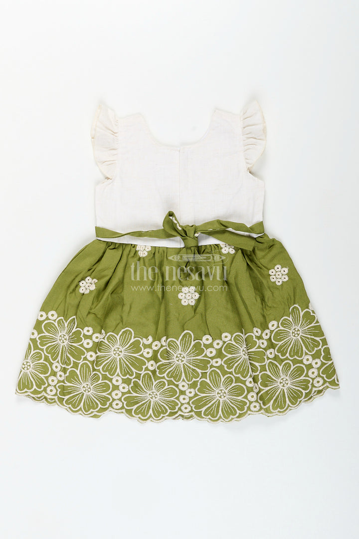 Green cotton frock for girls with white floral embroidery
