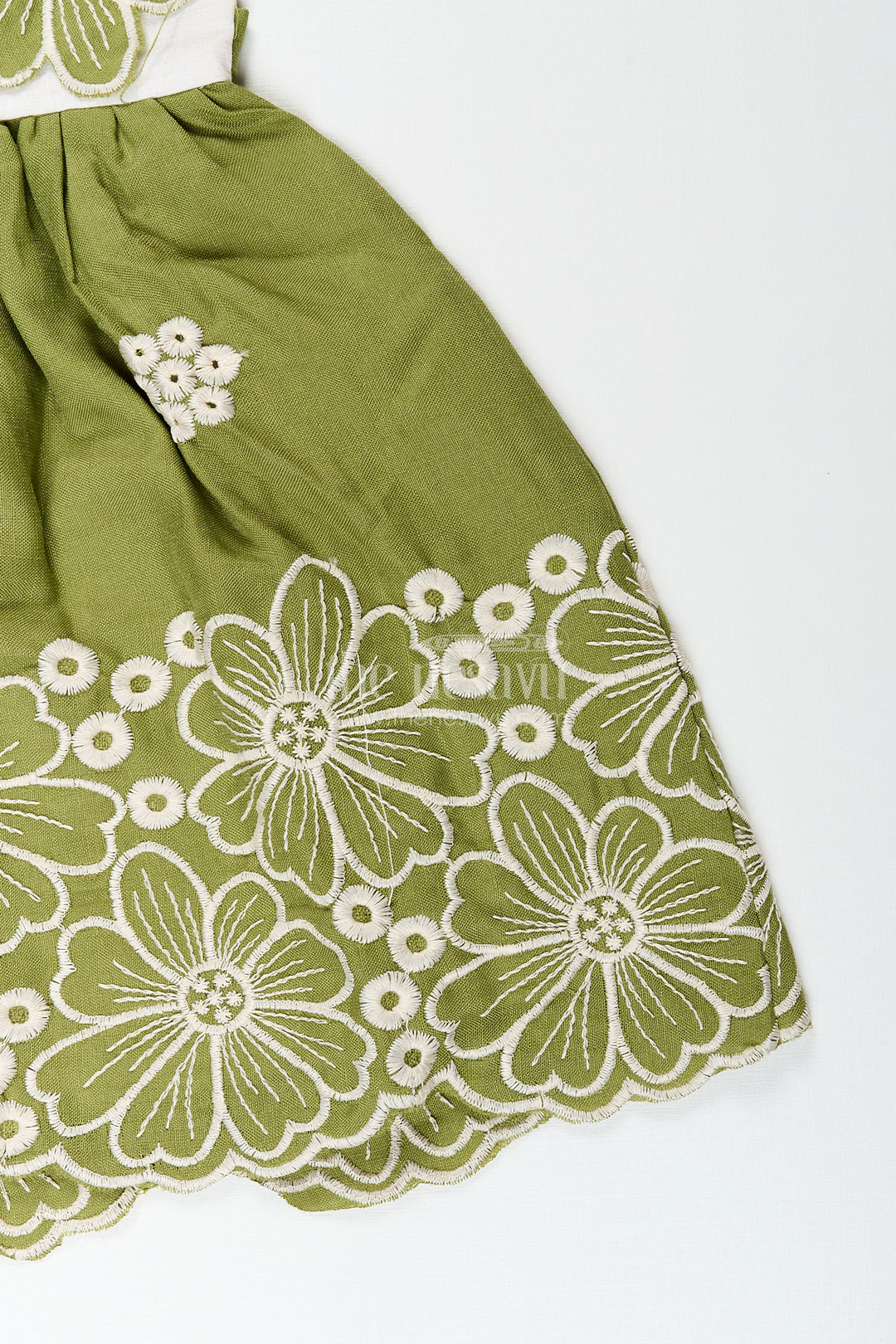 Green cotton frock for girls with white floral embroidery