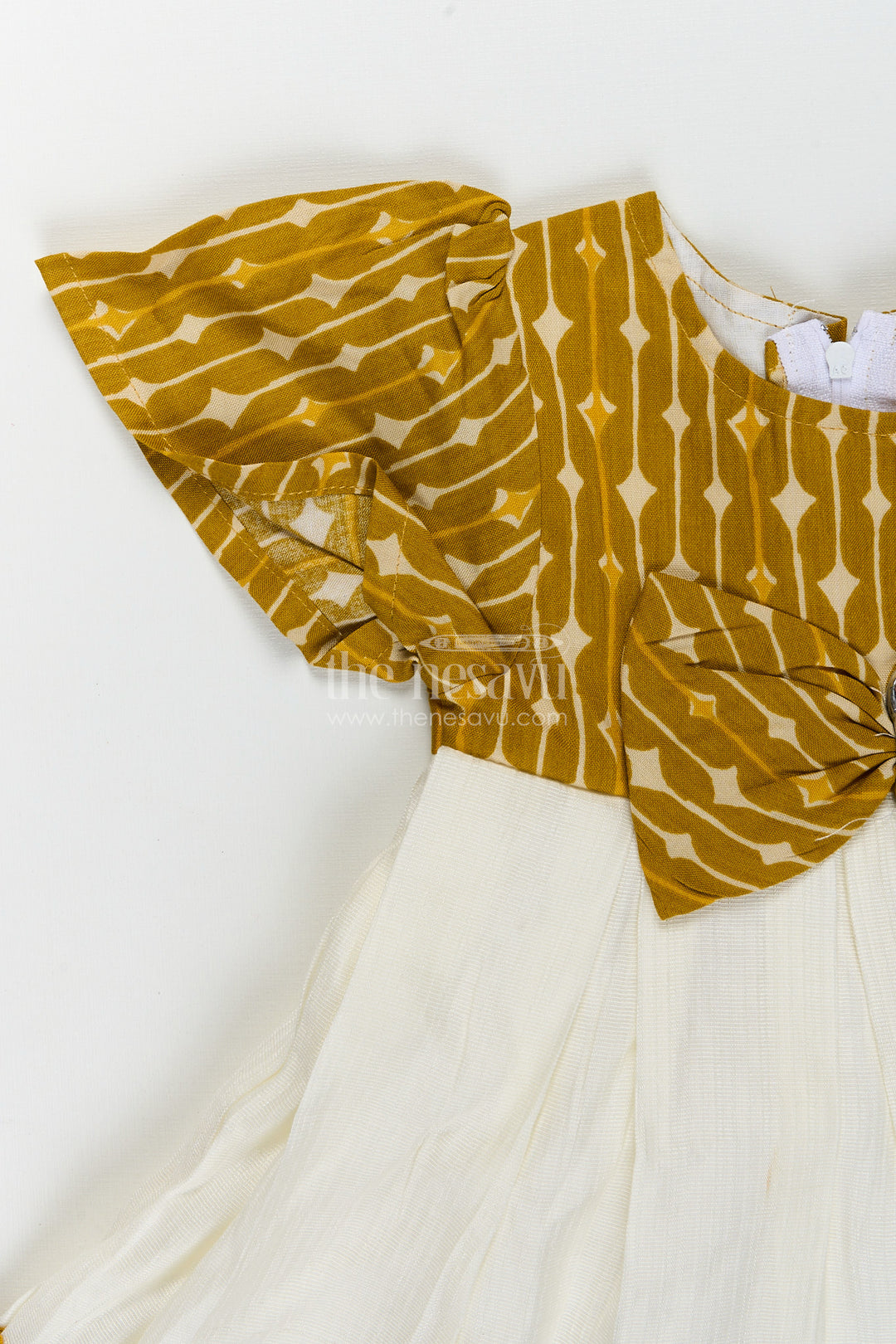 Cotton frock for toddler girls with printed yoke and ruffle hem