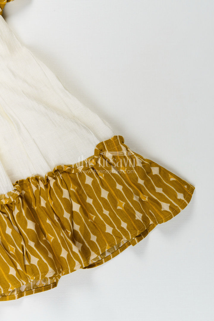 Cotton frock for toddler girls with printed yoke and ruffle hem