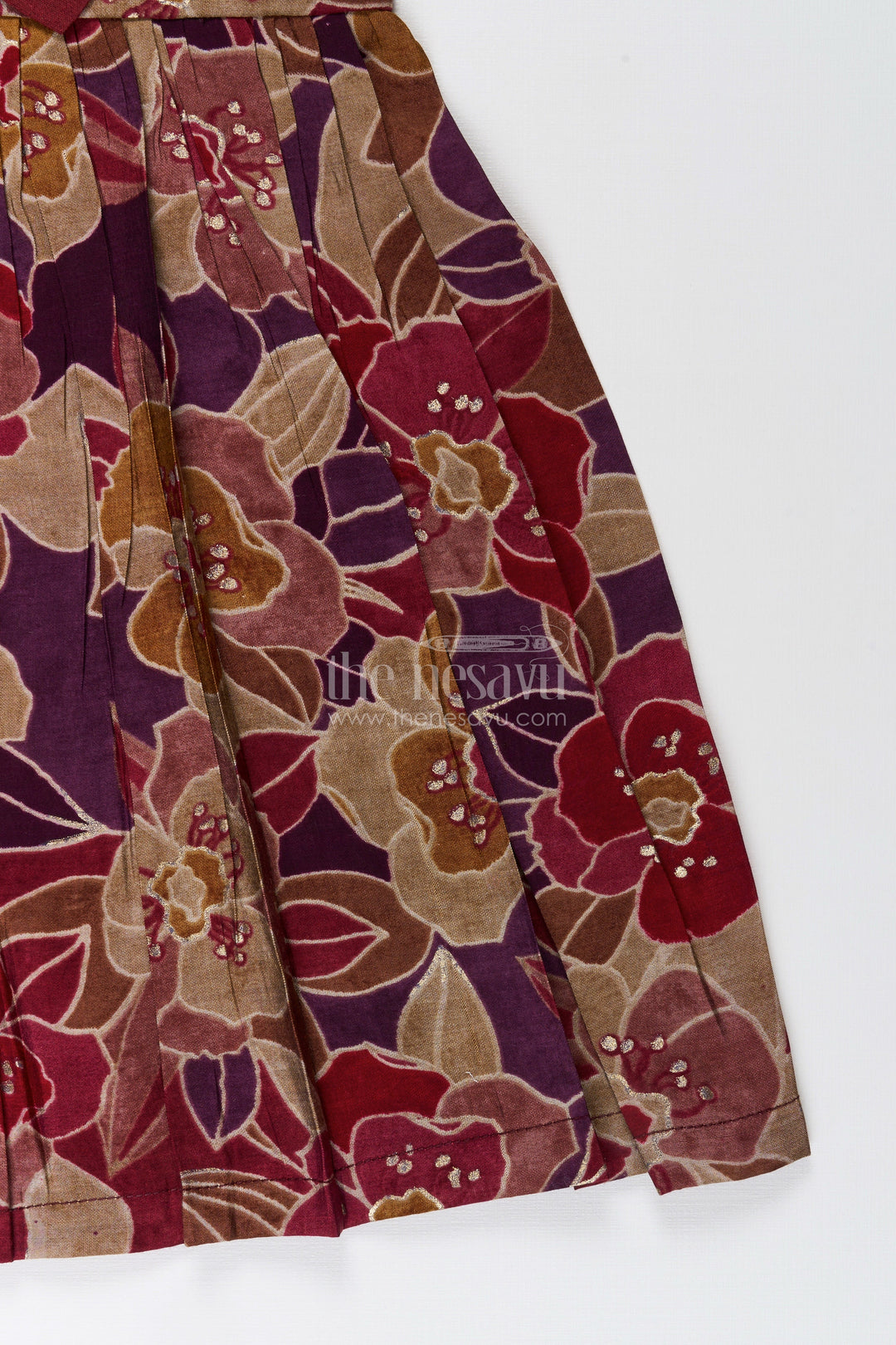 Party wear frock for toddler girls with bold floral print and bow detail