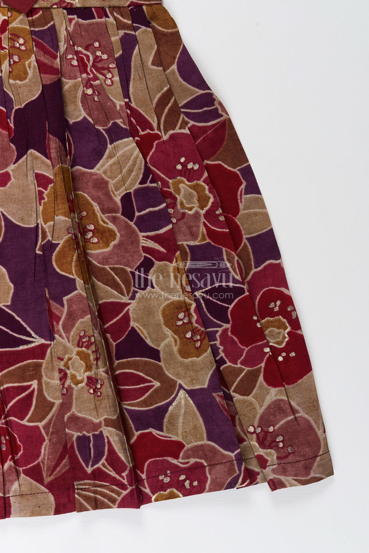 Party wear frock for toddler girls with bold floral print and bow detail