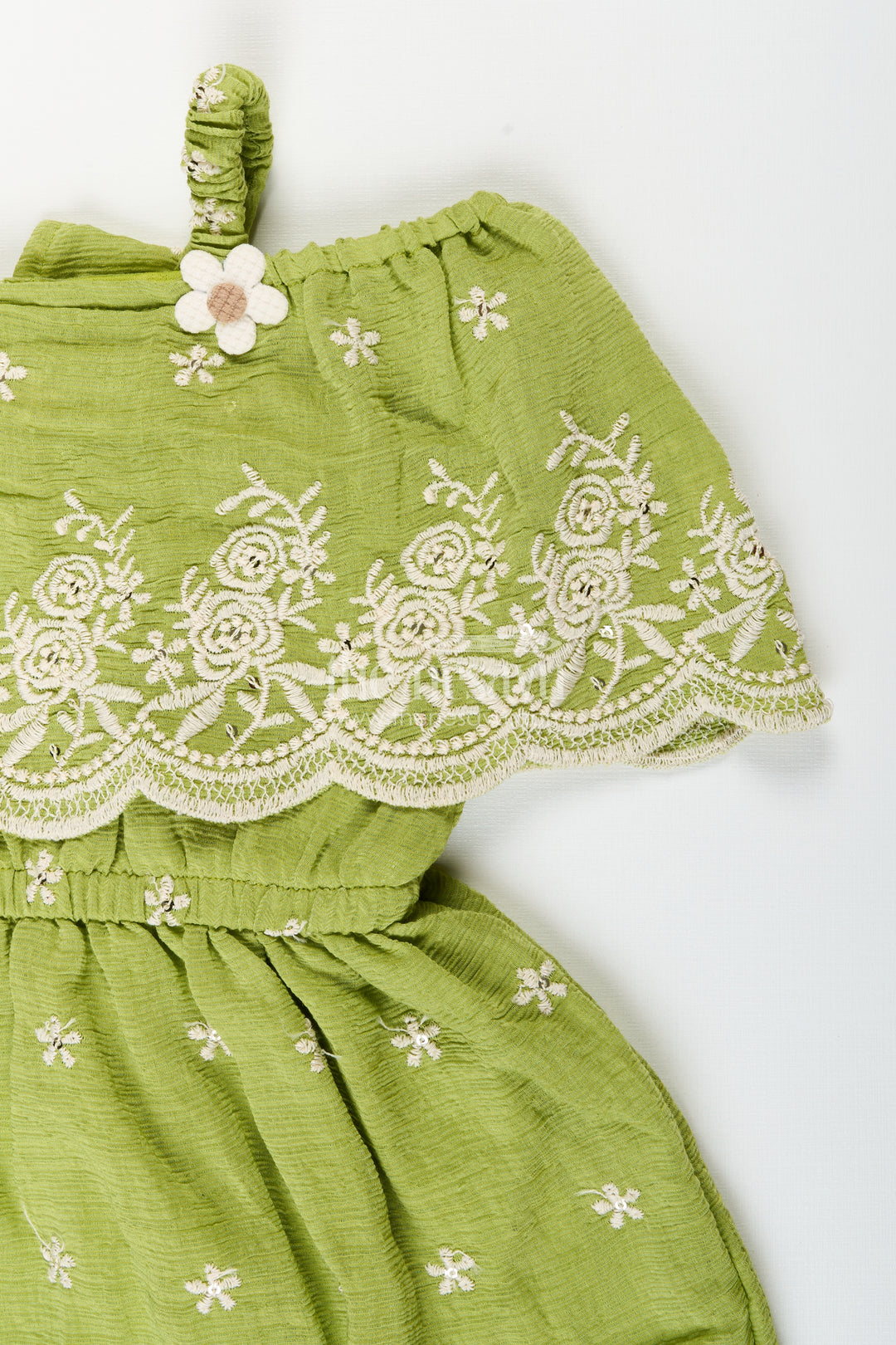 Girls green cotton frock with embroidery for birthdays and festive wear