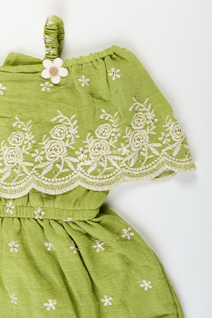Girls green cotton frock with embroidery for birthdays and festive wear