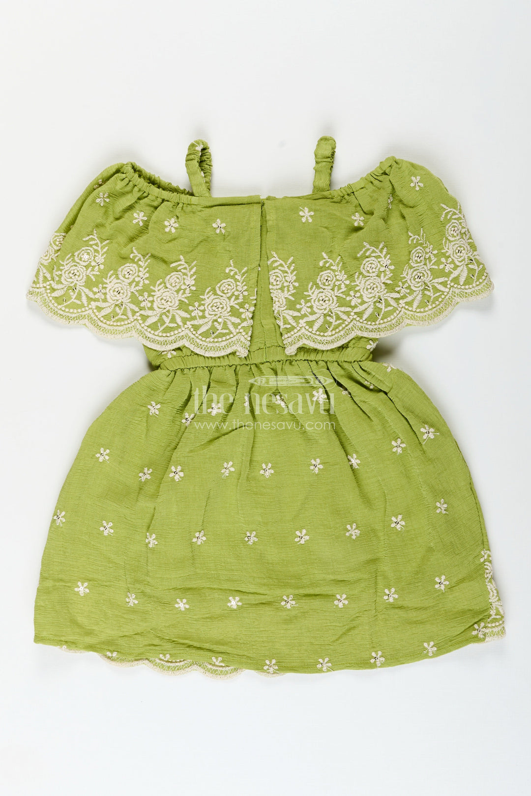 Girls green cotton frock with embroidery for birthdays and festive wear