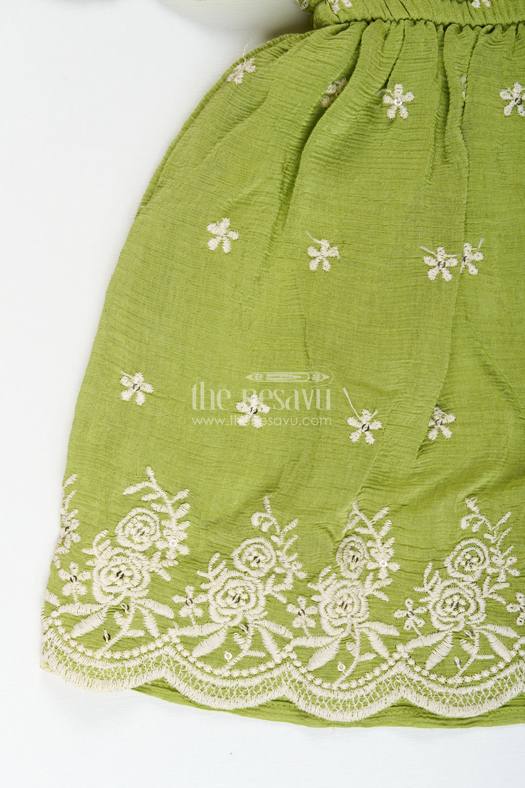 Girls green cotton frock with embroidery for birthdays and festive wear
