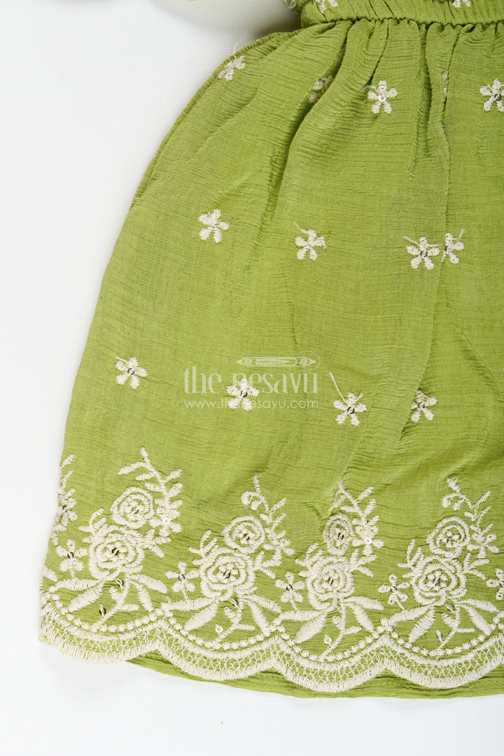 Girls green cotton frock with embroidery for birthdays and festive wear