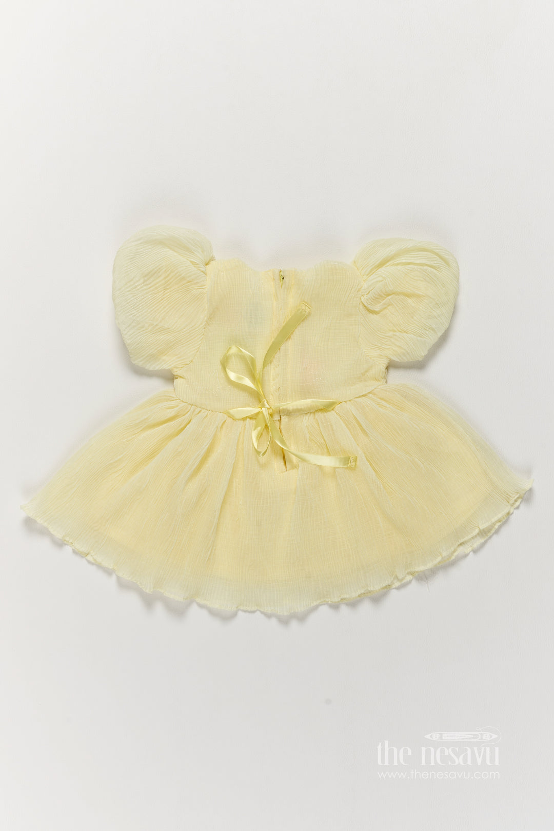 Girls Fancy Frock in Yellow with Smart Tailoring