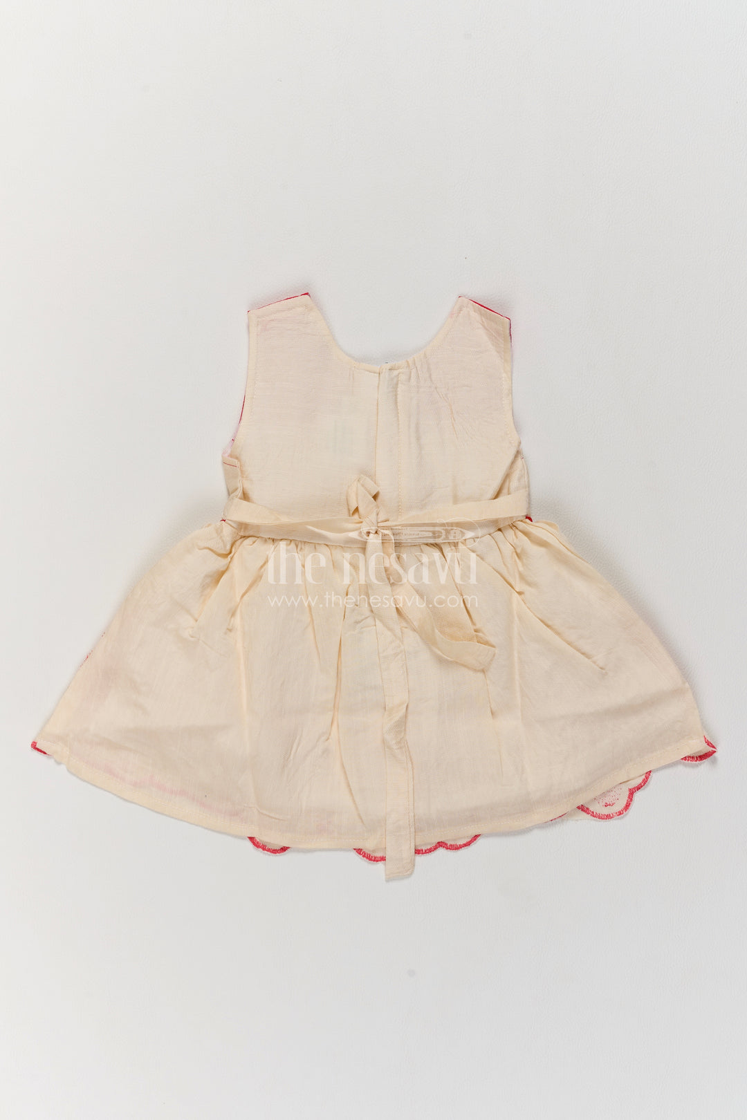 Girls Ivory Cotton Blend Frock with Fuchsia Yoke and Floral Hem