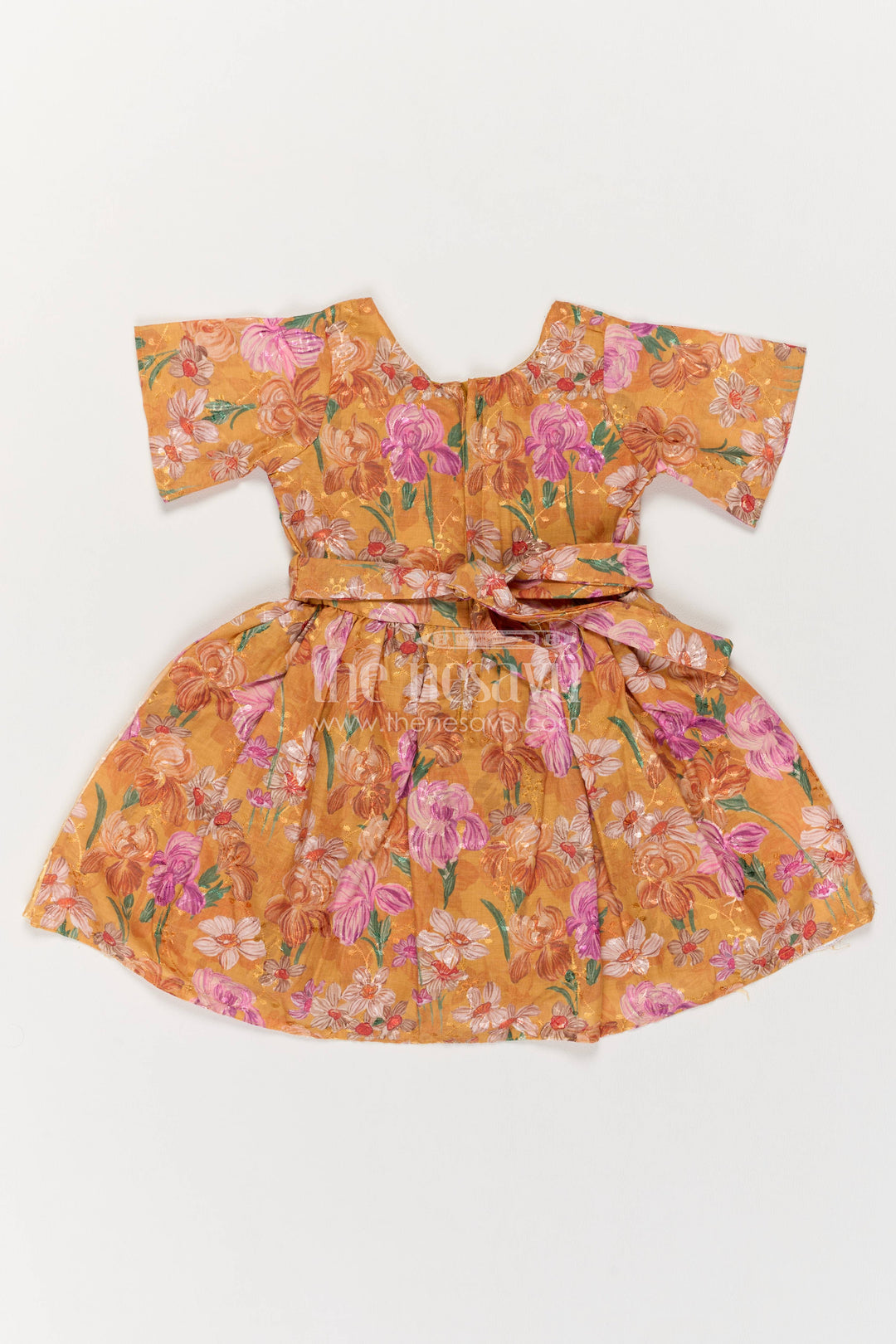 Designer Frock for Girls in Orange with an Occasion Ready Finish
