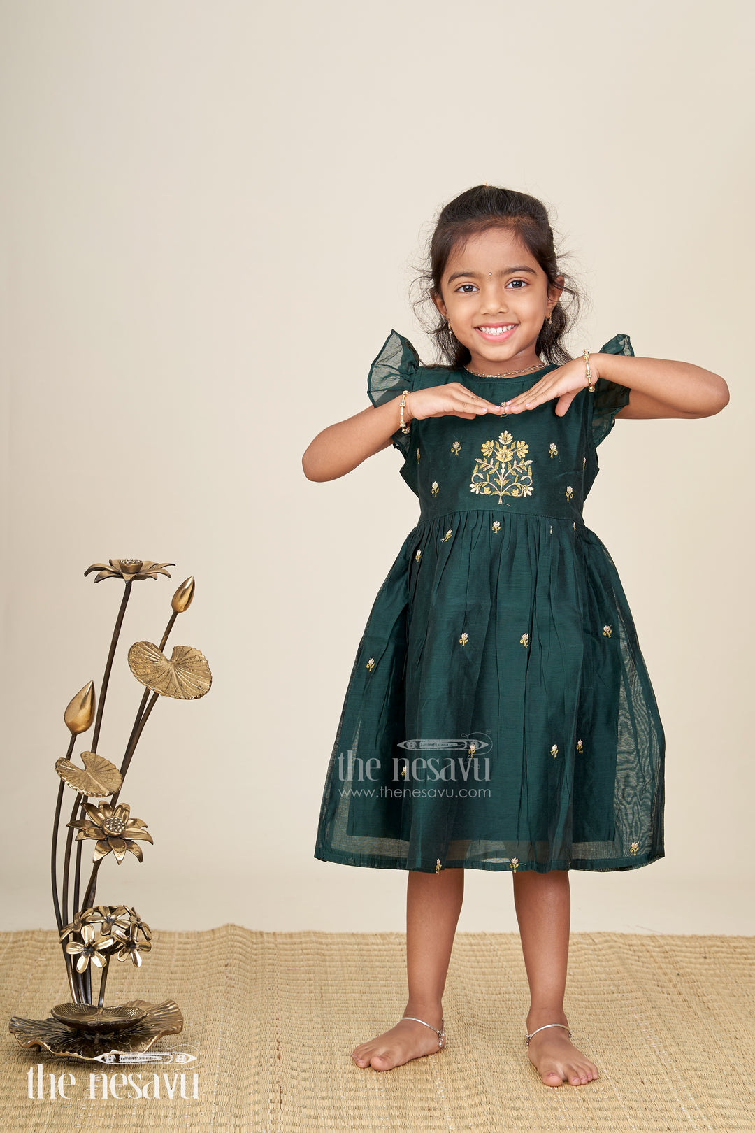 Girls Chanderi Cotton New Design Frock with Gold Thread Embroidery and Frilled Sleeves in Deep Green