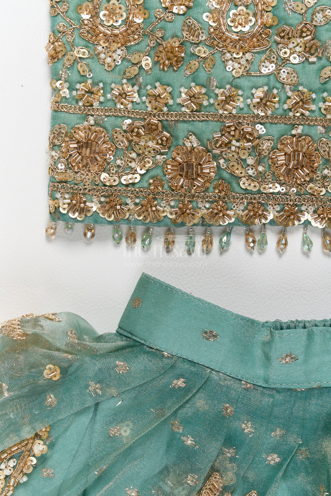 Fancy Lehenga for Girls in Turquoise with an Occasion Ready Finish