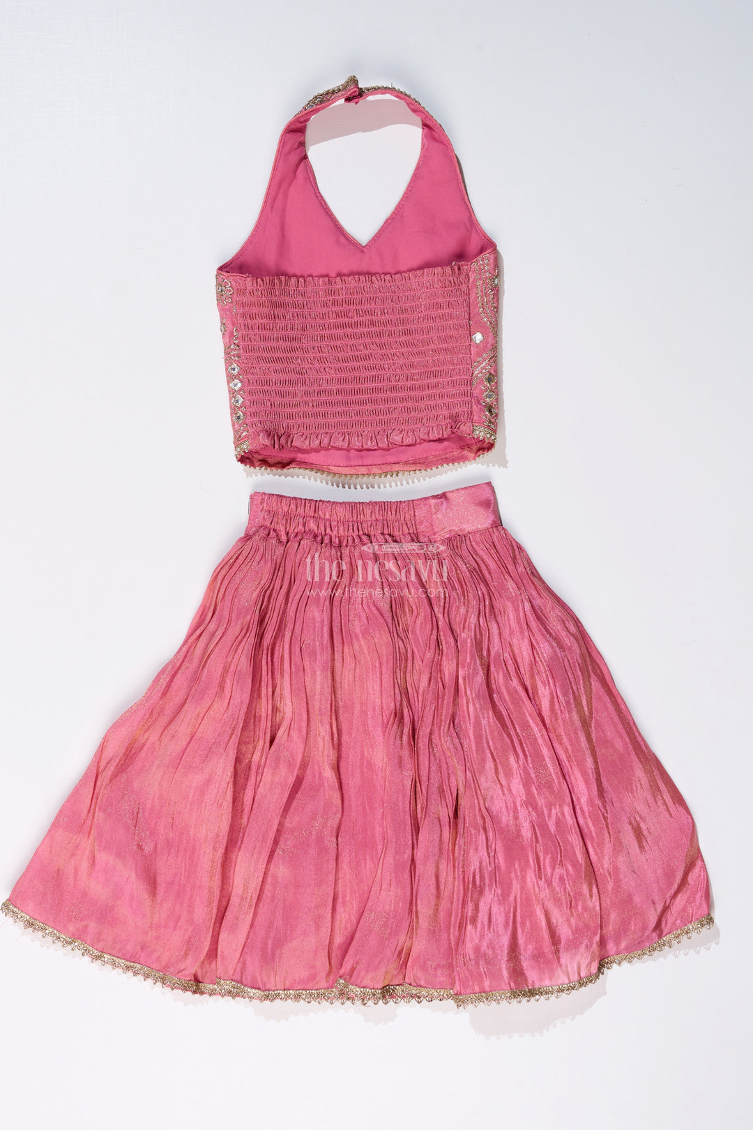 Girls Pink Reception Lehengas with Mirror Work Halter Blouse and Flowing Silk Skirt