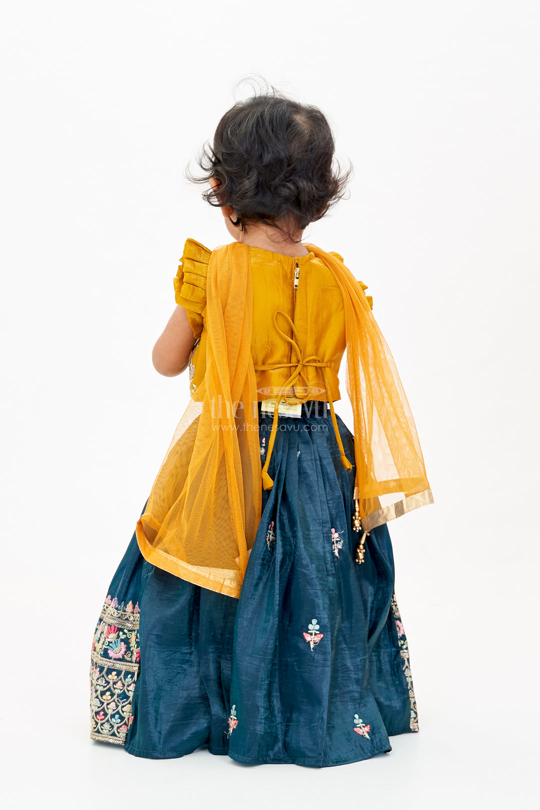 Girls Latest Lehengas in Fashion with Mustard Embroidered Blouse and Navy Flared Skirt