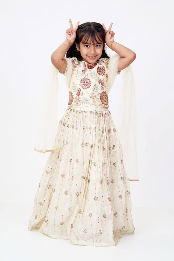 Girls Cream Lehenga Choli in Shimmer Viscose Silk with Floral Embroidery and Dupatta