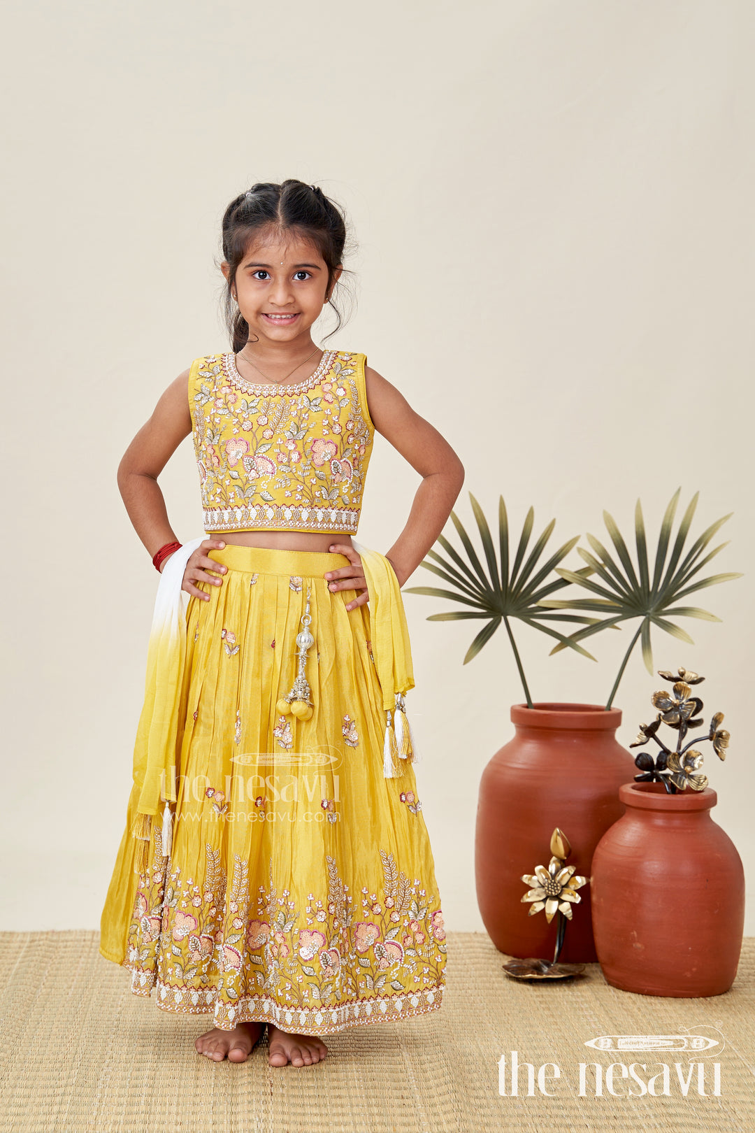 Lehenga Choli for Girls with Handcrafted Work in Vibrant Yellow Tissue Silk and Sequin Detailing