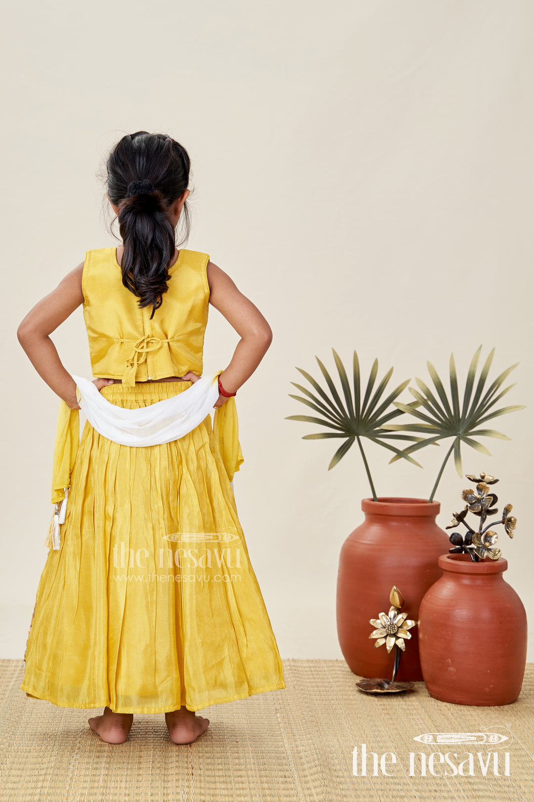 Lehenga Choli for Girls with Handcrafted Work in Vibrant Yellow Tissue Silk and Sequin Detailing
