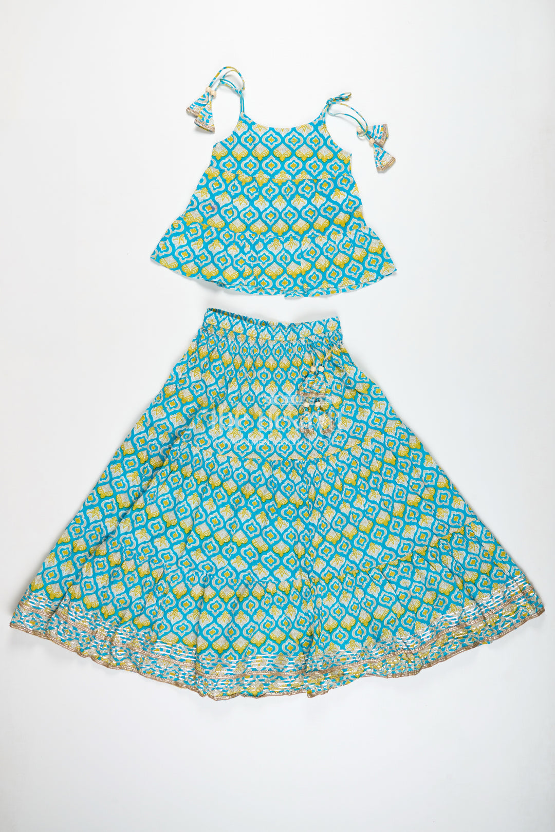Girls Printed Cotton Lehenga Choli With Ruffle Hem And Tassel Belt