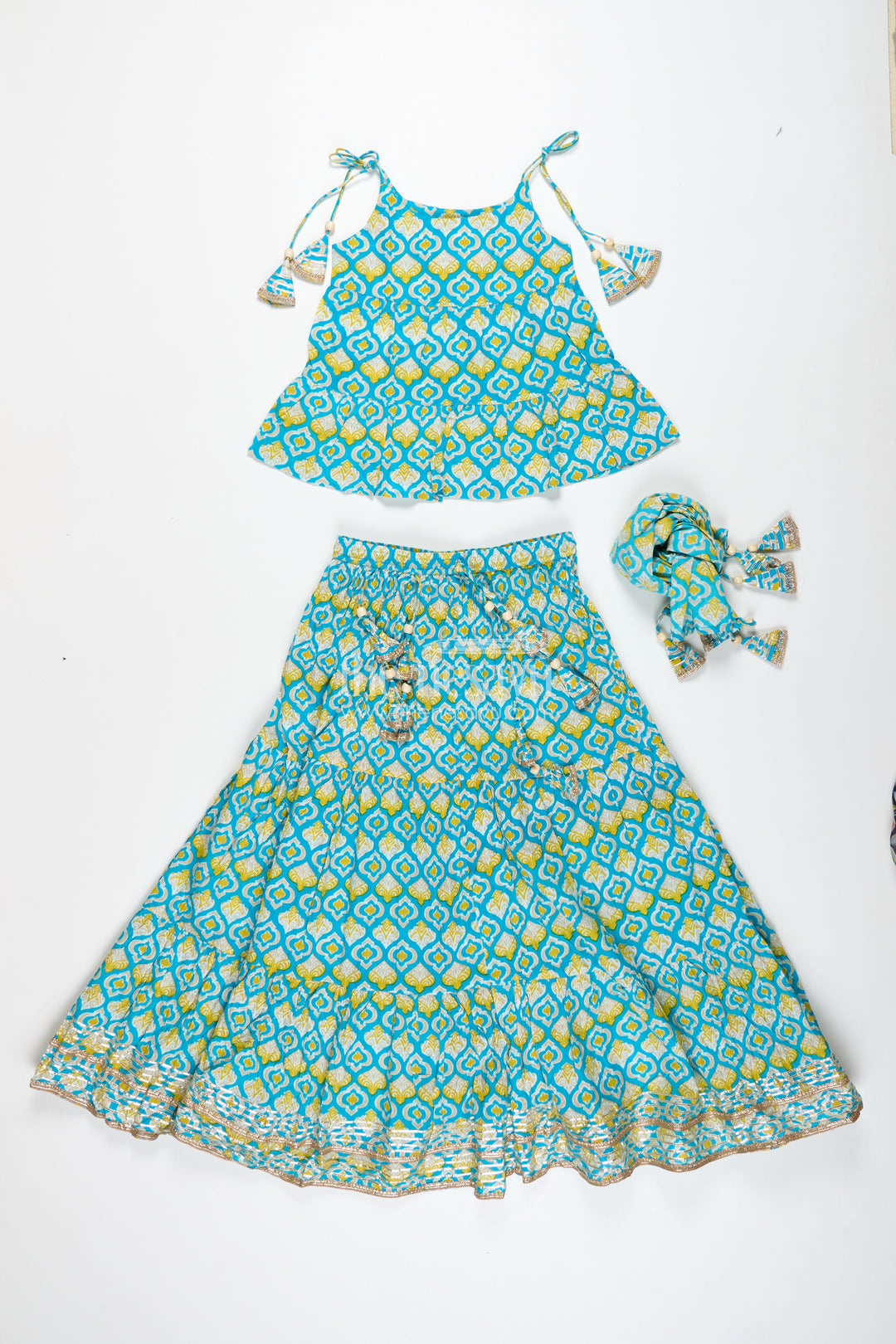 Girls Printed Cotton Lehenga Choli With Ruffle Hem And Tassel Belt