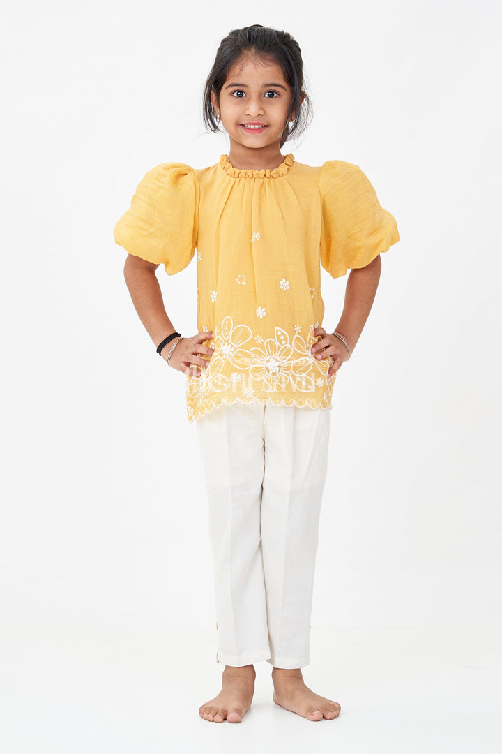 Suits and Co Ords for Girls in Mustard Cotton with White Pants and Floral Cutwork Embroidery