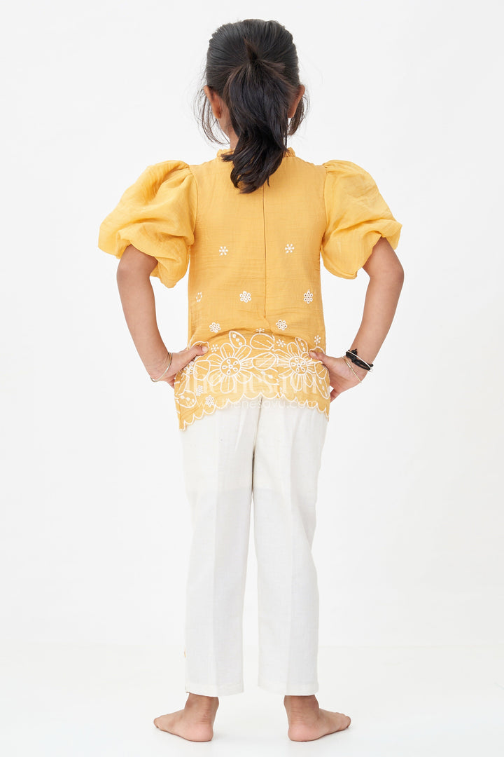 Suits and Co Ords for Girls in Mustard Cotton with White Pants and Floral Cutwork Embroidery