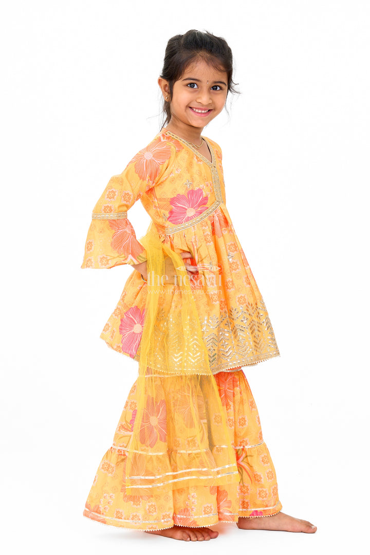 Girls Yellow Chinon Silk Sharara Set with Floral Print and Flared Sleeves for Festive Celebrations