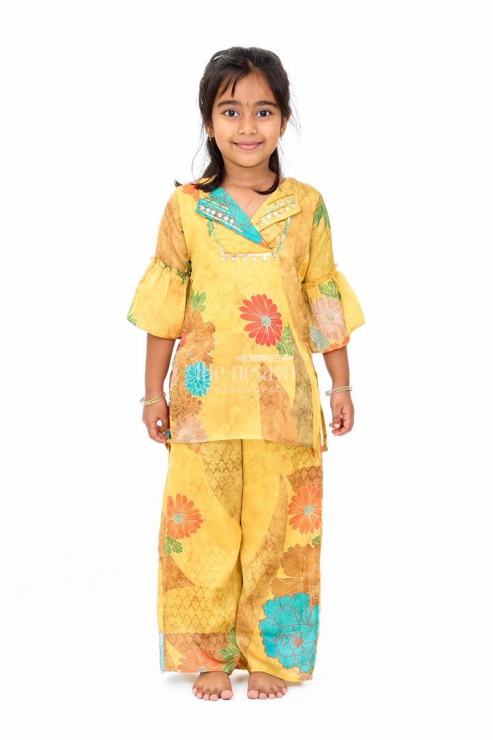 Mustard Mercerised Silk Cotton Girls Sharara Set with Bold Floral Print and Embellished Neckline