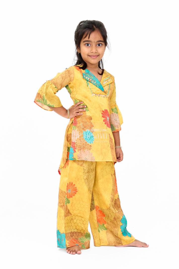Mustard Mercerised Silk Cotton Girls Sharara Set with Bold Floral Print and Embellished Neckline
