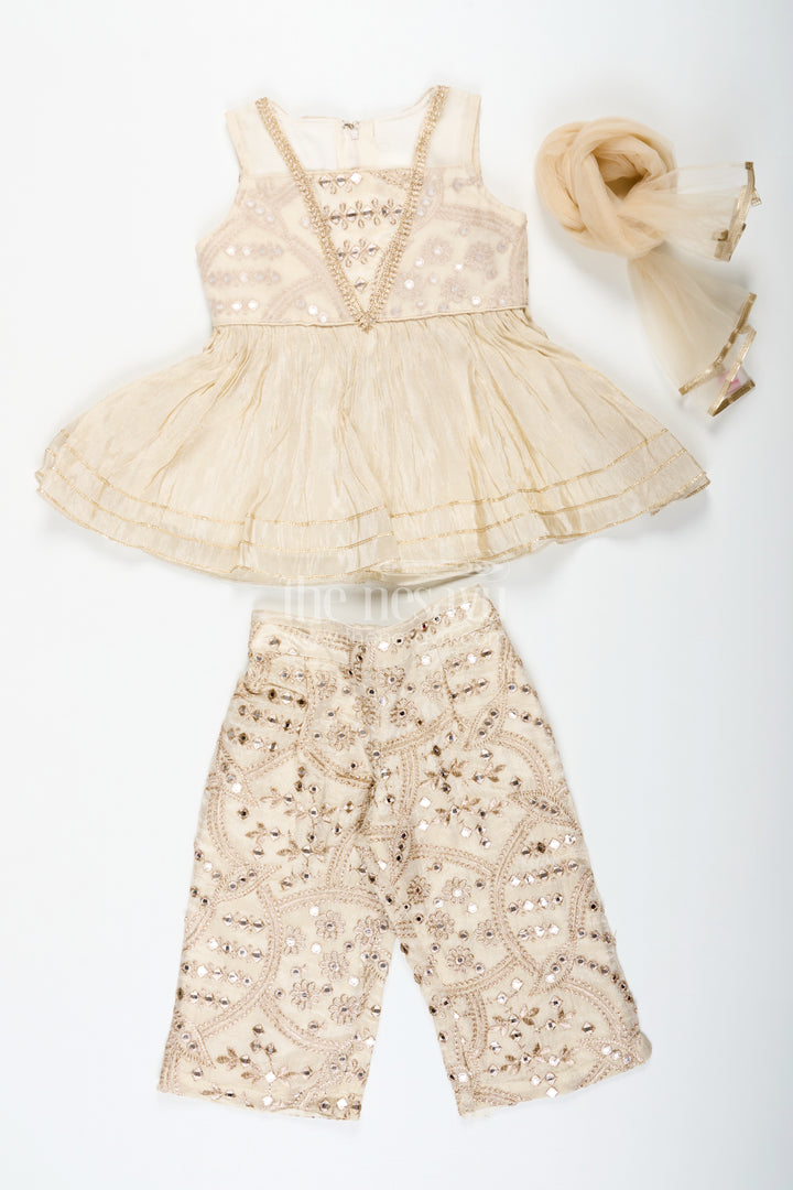 Girls Party Wear Sharara Dress in Viscose Tissue with Zari Thread Embroidery and Subtle Shine