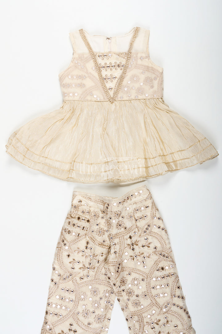 Girls Party Wear Sharara Dress in Viscose Tissue with Zari Thread Embroidery and Subtle Shine