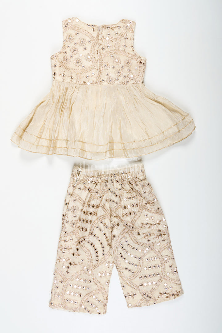 Girls Party Wear Sharara Dress in Viscose Tissue with Zari Thread Embroidery and Subtle Shine