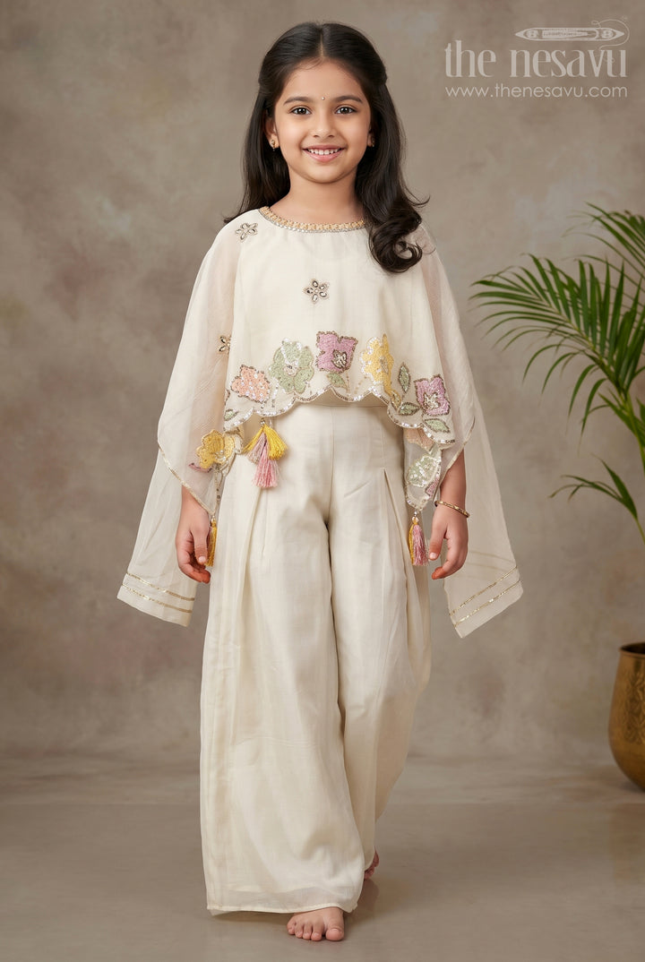 Cream Color Sharara Set for Girls in Shimmer Viscose Silk with Designer Embroidered Cape and Tassels