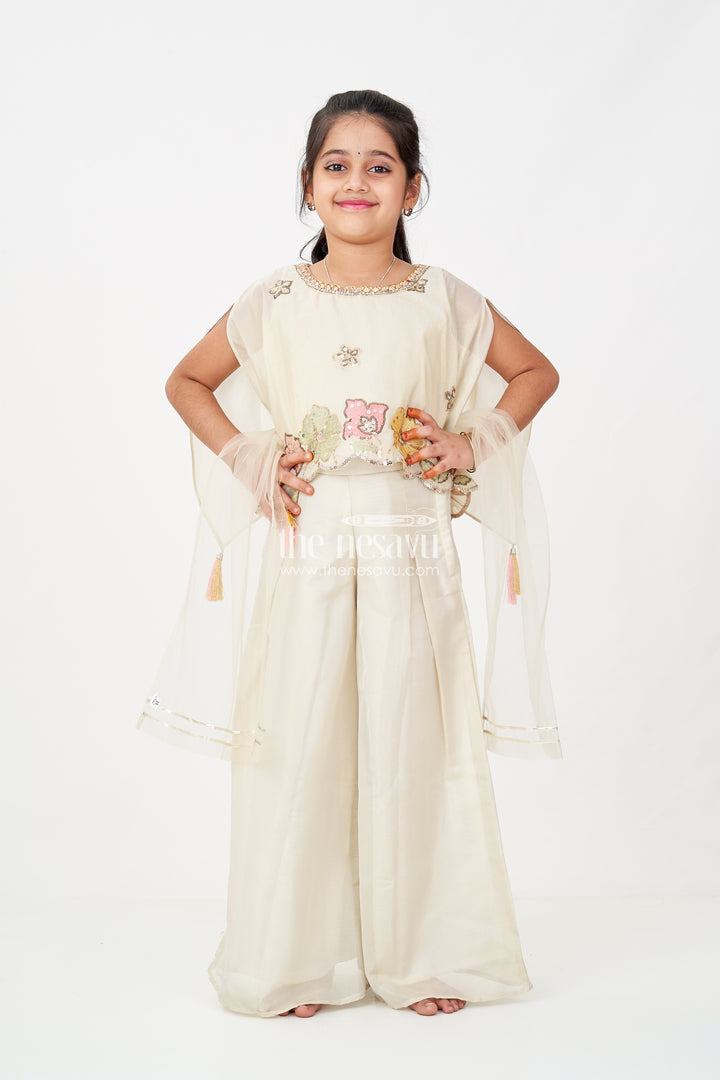Cream Color Sharara Set for Girls in Shimmer Viscose Silk with Designer Embroidered Cape and Tassels