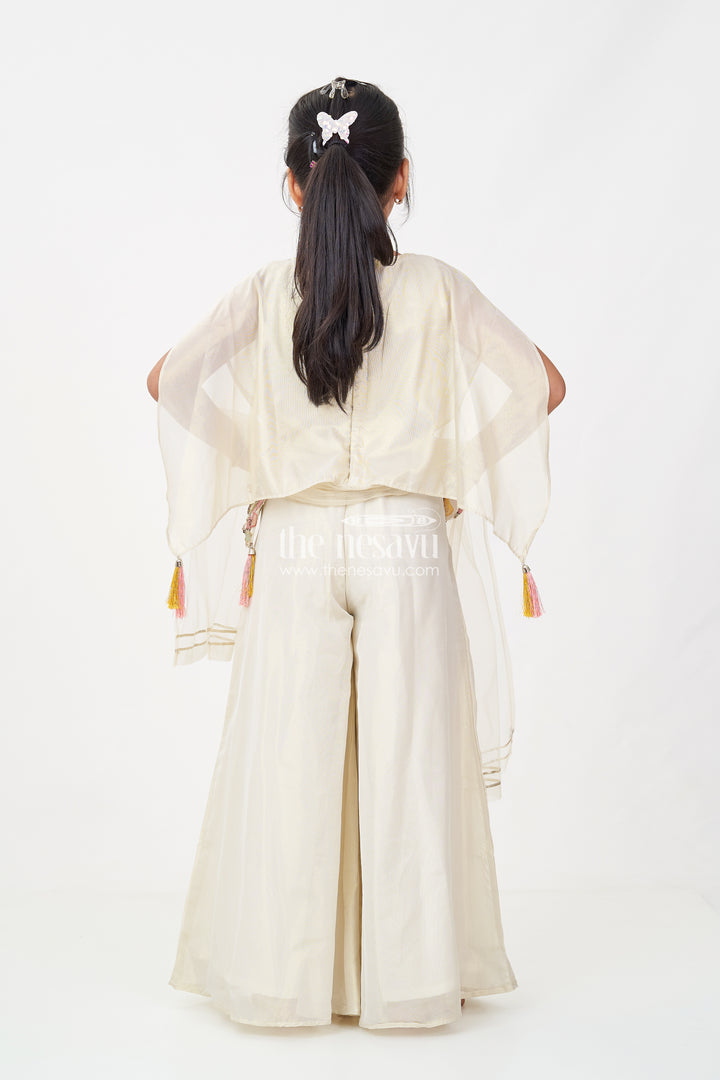 Cream Color Sharara Set for Girls in Shimmer Viscose Silk with Designer Embroidered Cape and Tassels