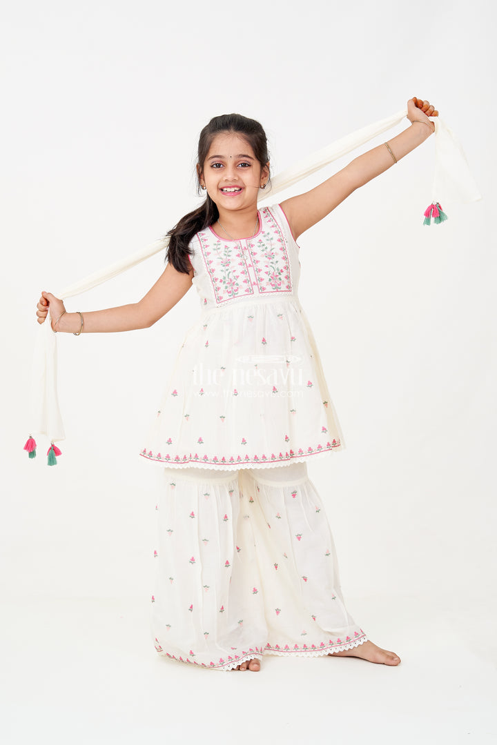 Girls white sharara set with Floral Embroidered Cotton Kurti and Tassel Dupatta for Graceful Outings