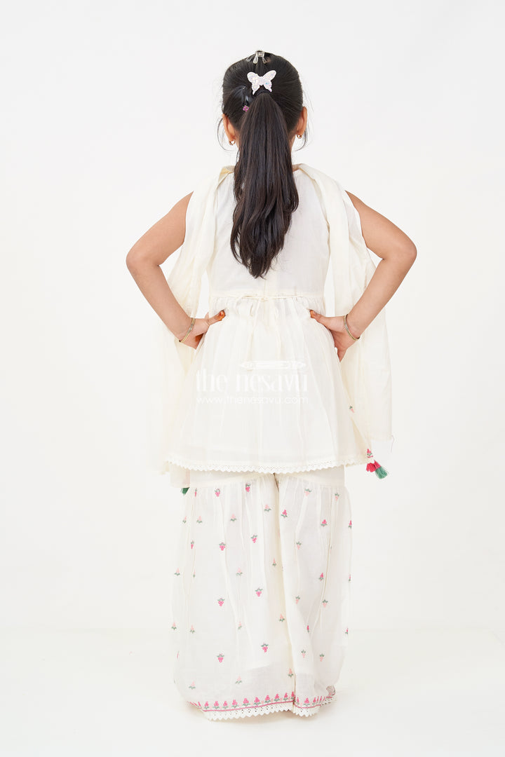 Girls white sharara set with Floral Embroidered Cotton Kurti and Tassel Dupatta for Graceful Outings