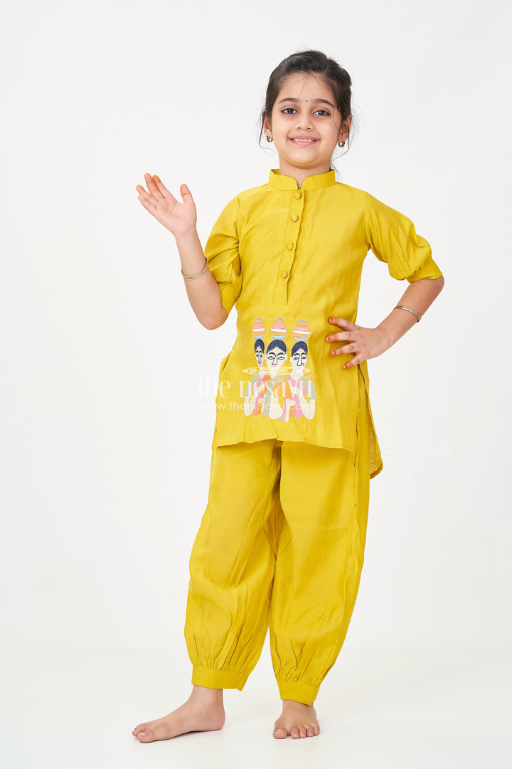Girls lemon yellow sharara Set in Modal Silk with Artistic Embroidery and Statement Kurti Design