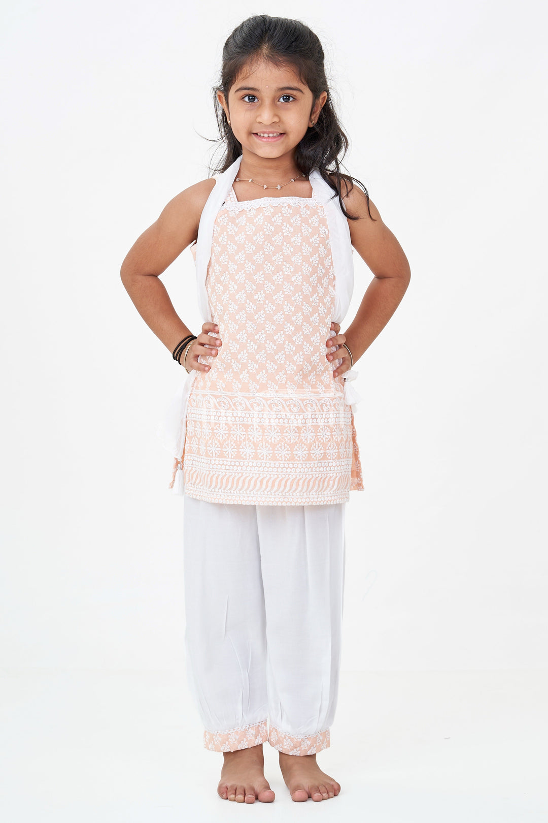 Girls Orange Chudi Set in Cotton with Embroidered Sleeveless Kurti and White Dhoti Pants
