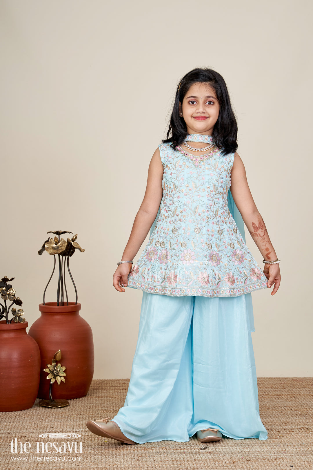 Girls blue sharara set with floral embroidery for festive family occasions
