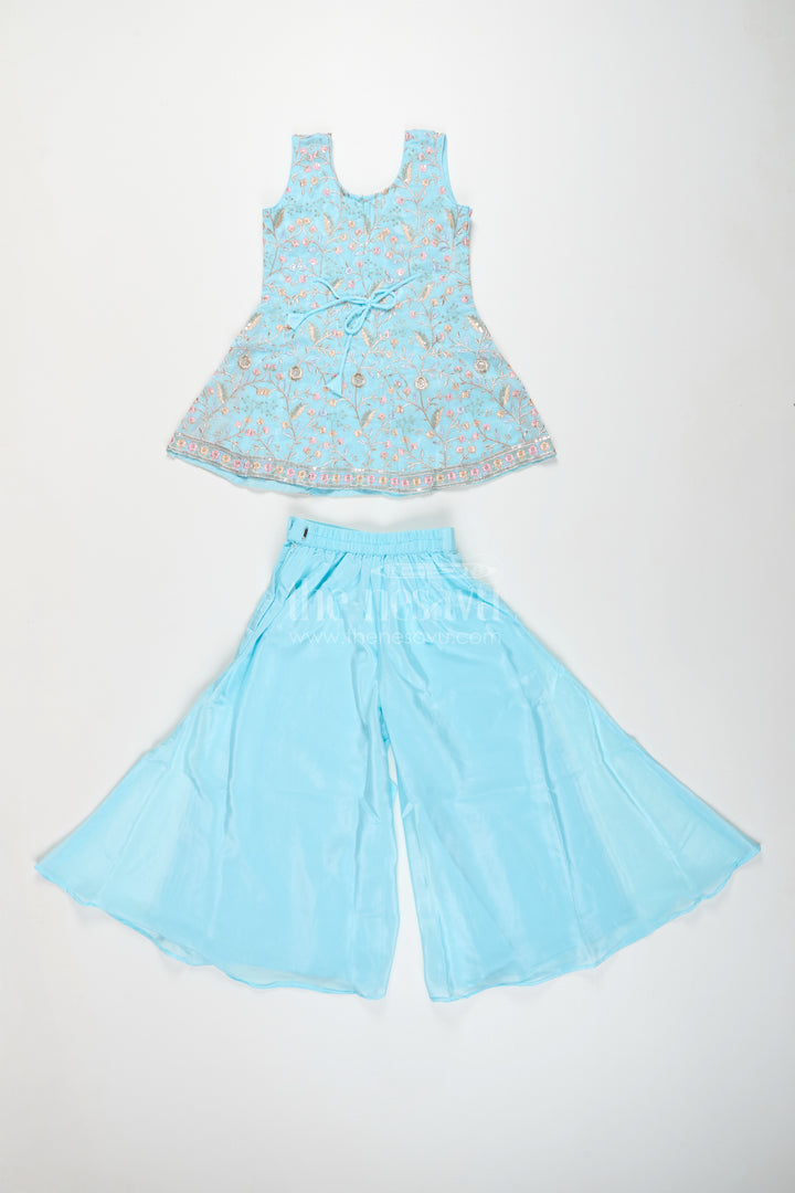 Girls blue sharara set with floral embroidery for festive family occasions